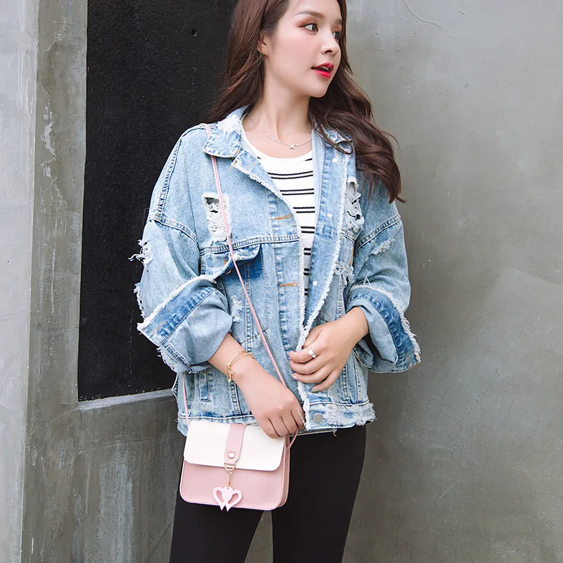Korean version of the cover type hanging small double heart vertical square package 2019 summer new one shoulder bag
Korean version of the cover type hanging small double heart vertical square package 2019 summer new one shoulder bag