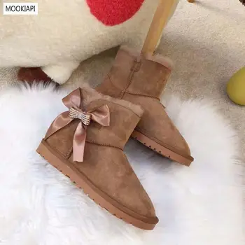 2019 China's latest fashion women's buckle snow boots, real sheepskin, 100% natural wool, high-quality shoes, free delivery 
2019 China's latest fashion women's buckle snow boots, real sheepskin, 100% natural wool, high-quality shoes, free delivery