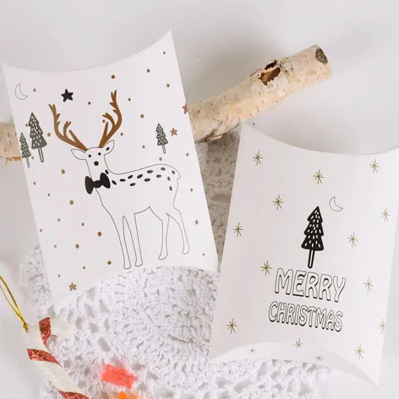50pcs/lot Simple Christmas Themed Pillow Shaped Candy Box Christmas Wrapped Gift Folding Paper Box 14x10x2.8cm
50pcs/lot Simple Christmas Themed Pillow Shaped Candy Box Christmas Wrapped Gift Folding Paper Box 14x10x2.8cm