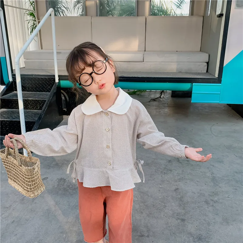 Children Shirt Spring 2020 New Girls Vertical Lapel Long Sleeve Cotton Casual Strip Blouses Baby Toddler Fresh with Tie Tops
Children Shirt Spring 2020 New Girls Vertical Lapel Long Sleeve Cotton Casual Strip Blouses Baby Toddler Fresh with Tie Tops