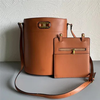 Lisa's same triumphal arch cowhide bucket bag with wide shoulder strap and single shoulder diagonal span large capacity handbag
Lisa's same triumphal arch cowhide bucket bag with wide shoulder strap and single shoulder diagonal span large capacity handbag
