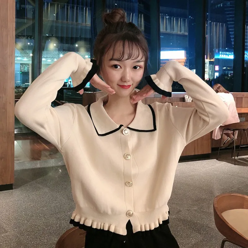 Fashion Lapel Sweater Cardigans Women Ruffle Button Cardigans Sweet Long-sleeve Knitted Sweater
Fashion Lapel Sweater Cardigans Women Ruffle Button Cardigans Sweet Long-sleeve Knitted Sweater