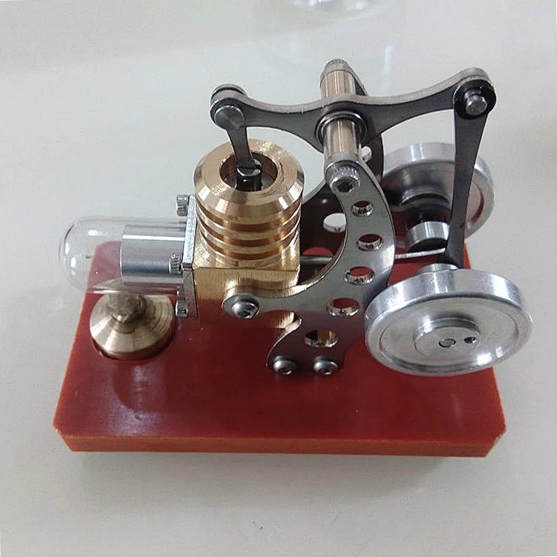 Metal Balance Type Stirling Engine Model Kit Scientific Experiment Engine Model With Wooden Base-Color Random
Metal Balance Type Stirling Engine Model Kit Scientific Experiment Engine Model With Wooden Base-Color Random