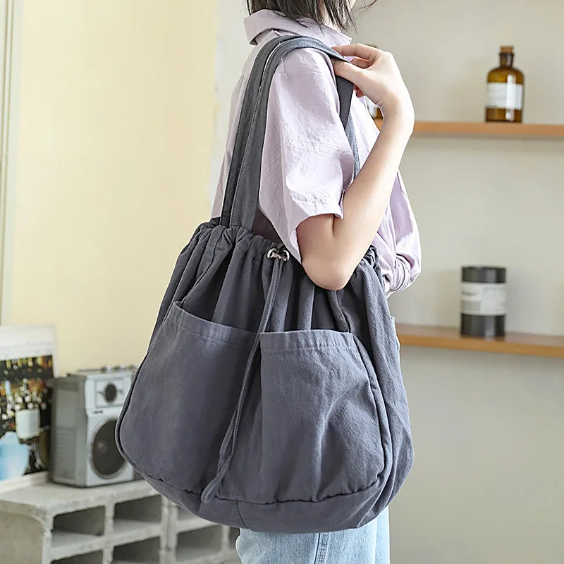2020 new Korean style simple drawstring drawstring female handbag casual large-capacity washed canvas bag all-match shoulder bag
2020 new Korean style simple drawstring drawstring female handbag casual large-capacity washed canvas bag all-match shoulder bag