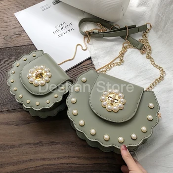 2020 Summer New Saddle Bag High Quality PU Leather Flip Bag Women's Designer Handbag Pearl Lock Chain Shoulder Messenger Bags
2020 Summer New Saddle Bag High Quality PU Leather Flip Bag Women's Designer Handbag Pearl Lock Chain Shoulder Messenger Bags