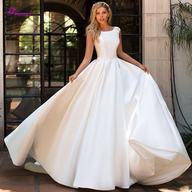 Fsuzwel Sexy Scoop Neck Backless Satin A-Line Wedding Dress 2019 Luxury Beaded Cap Sleeve Appliques Bridal Gown Vestido de Noiva
Fsuzwel Sexy Scoop Neck Backless Satin A-Line Wedding Dress 2019 Luxury Beaded Cap Sleeve Appliques Bridal Gown Vestido de Noiva