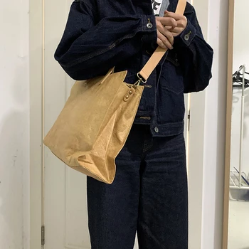 A brown paper capacity retro single shoulder diagonal cross tote dual purpose large bag
A brown paper capacity retro single shoulder diagonal cross tote dual purpose large bag