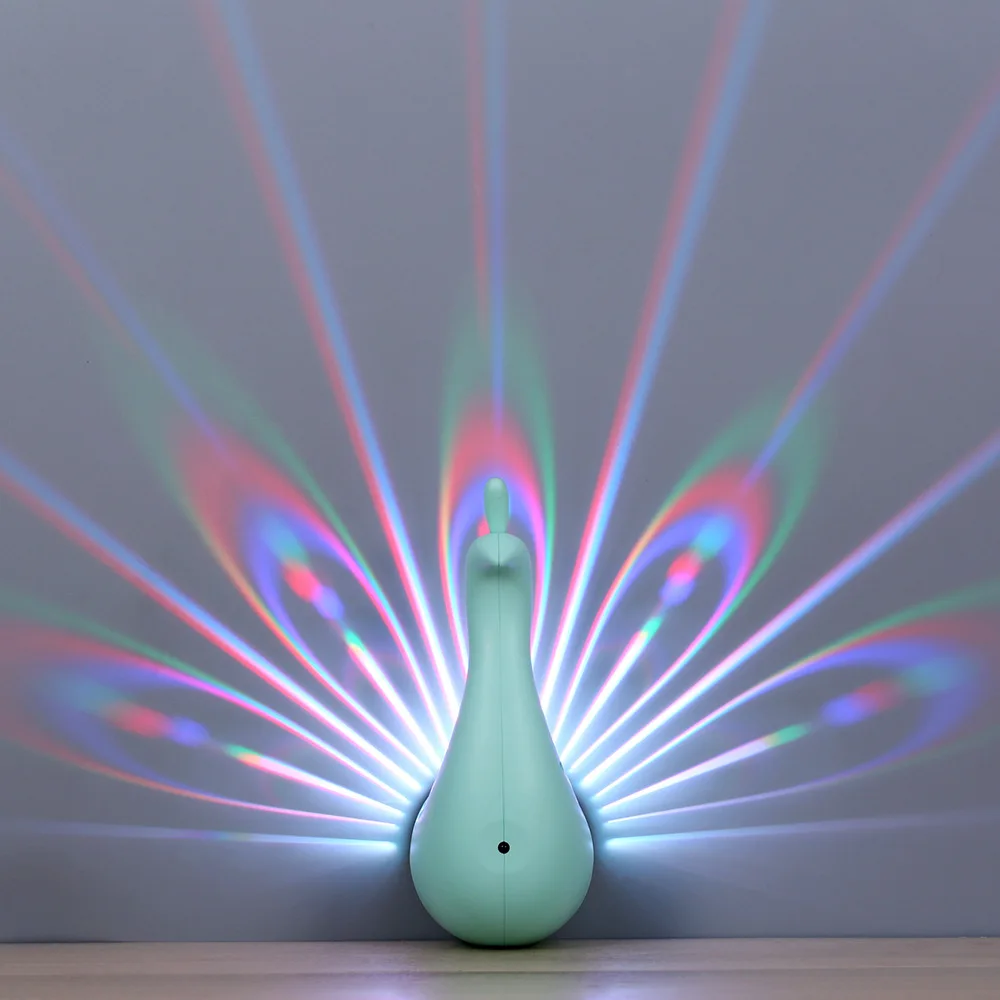 New Style Decoration Colorful Lamp Peacock Projection Small Night Lamp Colorful Projection Rechargeable Remote Control LED Wall
New Style Decoration Colorful Lamp Peacock Projection Small Night Lamp Colorful Projection Rechargeable Remote Control LED Wall