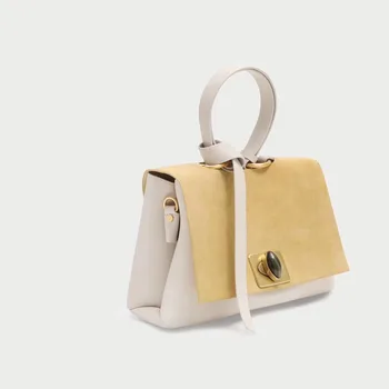 2009 deerskin velvet color cattle hide single shoulder slanting lock knot dumpling bag new large capacity handbag
2009 deerskin velvet color cattle hide single shoulder slanting lock knot dumpling bag new large capacity handbag