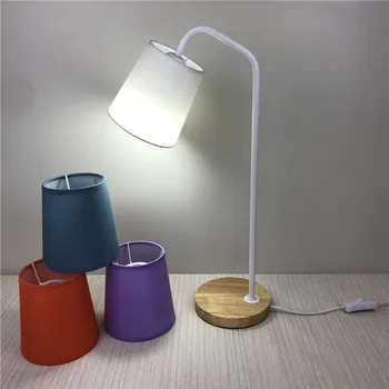 Factory direct sales round bottom solid wood base KD pure color Korean small fresh series lampshade desk reading lamp
Factory direct sales round bottom solid wood base KD pure color Korean small fresh series lampshade desk reading lamp