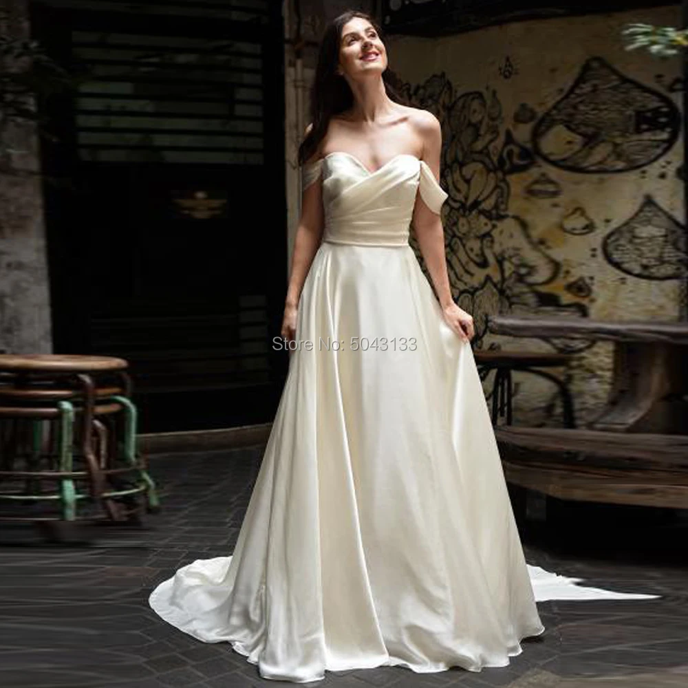 Elegant Satin A Line Wedding Dresses with Long Sash 2019 Pleated Sweetheart Cap Sleeves Buttons Back Sweep Train Bridal Gowns 
Elegant Satin A Line Wedding Dresses with Long Sash 2019 Pleated Sweetheart Cap Sleeves Buttons Back Sweep Train Bridal Gowns