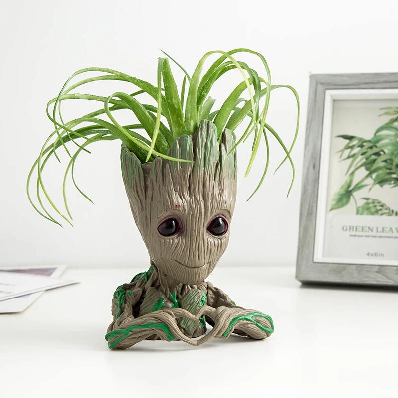 Artificial Plants Baby Groot Flowerpot Home Decoration Pen Pot Holder Hero Model Baby Tree Plant Pot Flowerpot Desktop Decor
Artificial Plants Baby Groot Flowerpot Home Decoration Pen Pot Holder Hero Model Baby Tree Plant Pot Flowerpot Desktop Decor