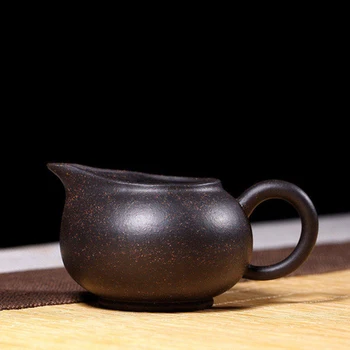 Through the ages, yixing purple sand points kung fu tea tea device accessories all hand tea black sea sand fair mug
Through the ages, yixing purple sand points kung fu tea tea device accessories all hand tea black sea sand fair mug