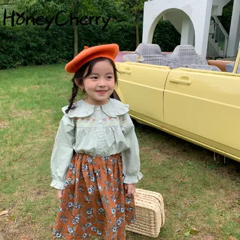 Girls' tops 2020 autumn children's clothing long-sleeved embroidered lapel shirt + half-length corduroy floral skirt
Girls' tops 2020 autumn children's clothing long-sleeved embroidered lapel shirt + half-length corduroy floral skirt