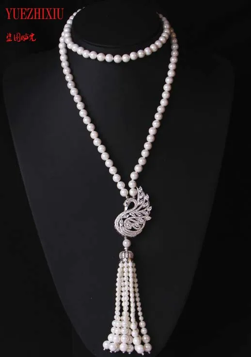 wholesale Gifts 8mm shell pearl necklace Swan Zircon Pendant sweater chain long neck chain 32inch
wholesale Gifts 8mm shell pearl necklace Swan Zircon Pendant sweater chain long neck chain 32inch