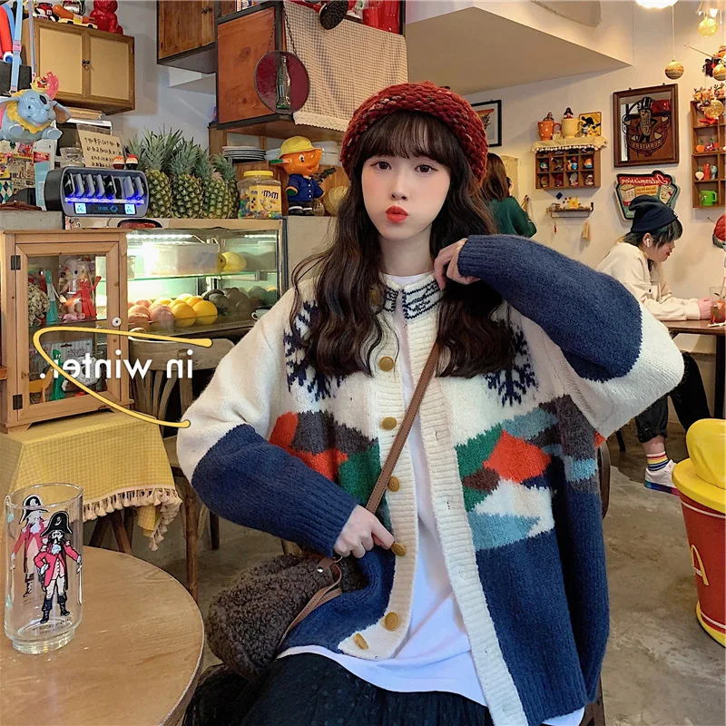 Fashion women's cardigan autumn and winter warm knitted coat button sweater elegant printing cardigan 2020 women's clothing
Fashion women's cardigan autumn and winter warm knitted coat button sweater elegant printing cardigan 2020 women's clothing