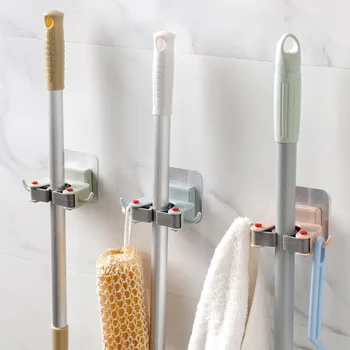 Multi-function Perforated Mop Rack Toilet Wall Hanging Mop Adhesive Hook Bathroom Wall Broom Hanger Mop Clip 
Multi-function Perforated Mop Rack Toilet Wall Hanging Mop Adhesive Hook Bathroom Wall Broom Hanger Mop Clip