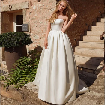 Elegant Strapless Sleeveless Satin Wedding Dress with Lace Bolero Robe de Mariee Simple Sweep Train Bridal Gown
Elegant Strapless Sleeveless Satin Wedding Dress with Lace Bolero Robe de Mariee Simple Sweep Train Bridal Gown