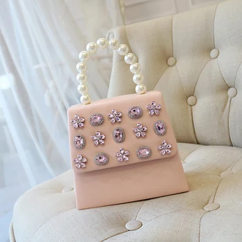 Women Fashion Handbag Pearl Tring Top-handle Crystal Rhinestone Beaded Cover Clutch Purse Lady High-end PU Leather Shoulder Bag
Women Fashion Handbag Pearl Tring Top-handle Crystal Rhinestone Beaded Cover Clutch Purse Lady High-end PU Leather Shoulder Bag