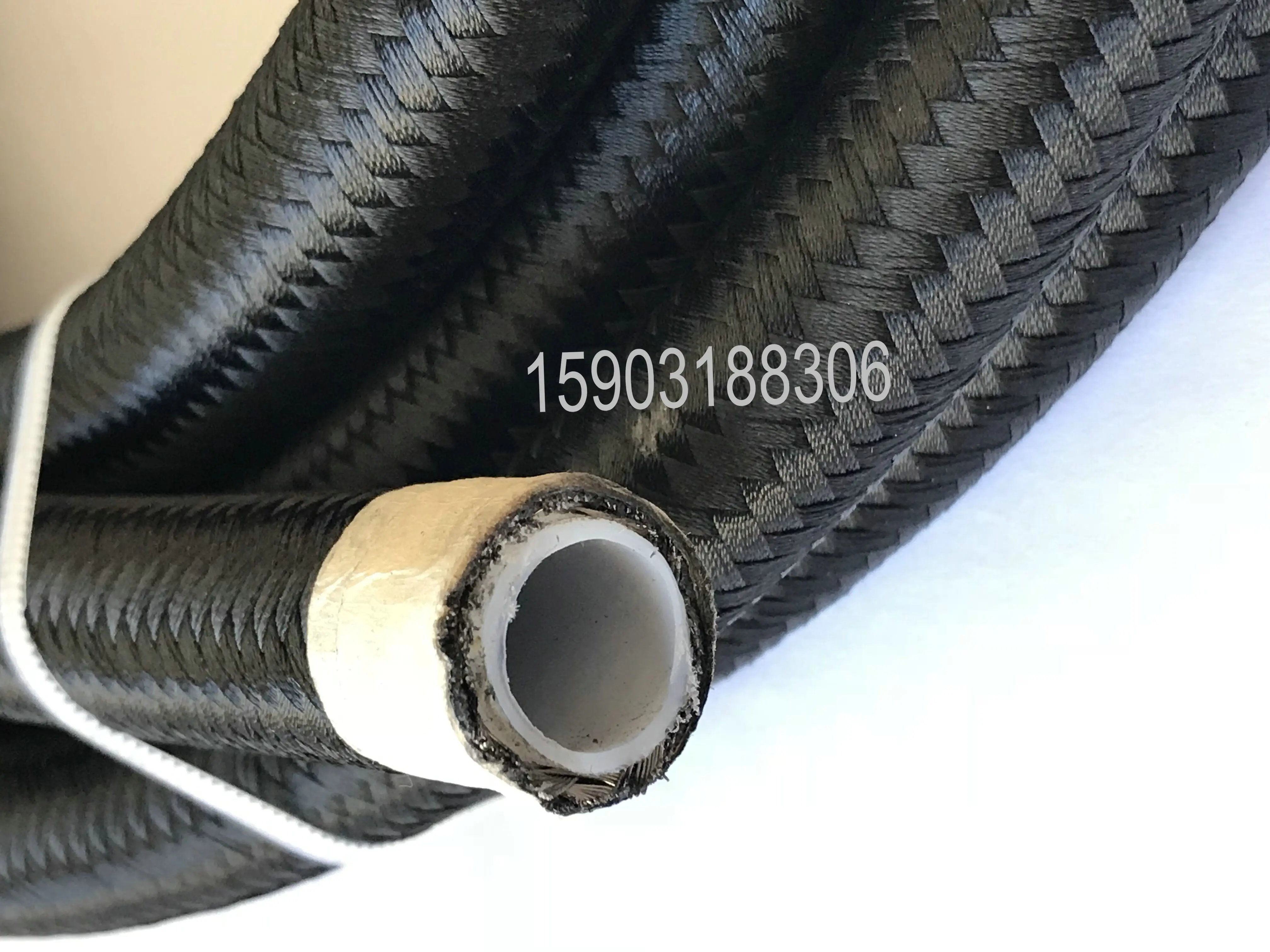 20 Meters x PTFE Braided Oil Hose In Black Nylon Oil Fuel Petrol Coolant Size AN12
20 Meters x PTFE Braided Oil Hose In Black Nylon Oil Fuel Petrol Coolant Size AN12