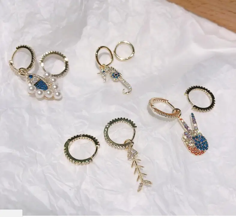 Cute cartoon color rhiny rhiestone fish asymmetric earrings chic bone ok cute ear accessories
Cute cartoon color rhiny rhiestone fish asymmetric earrings chic bone ok cute ear accessories