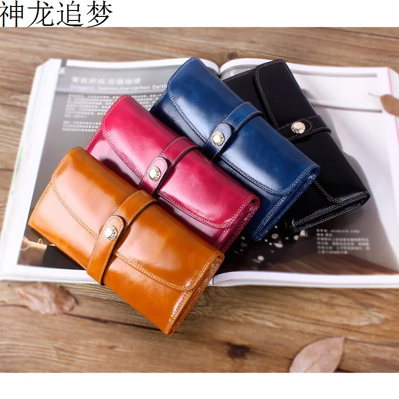 High quality womens Cowhide leather wallets business Genuine Leather wallet buckle ladies Purse card holder wallet women purse
High quality womens Cowhide leather wallets business Genuine Leather wallet buckle ladies Purse card holder wallet women purse