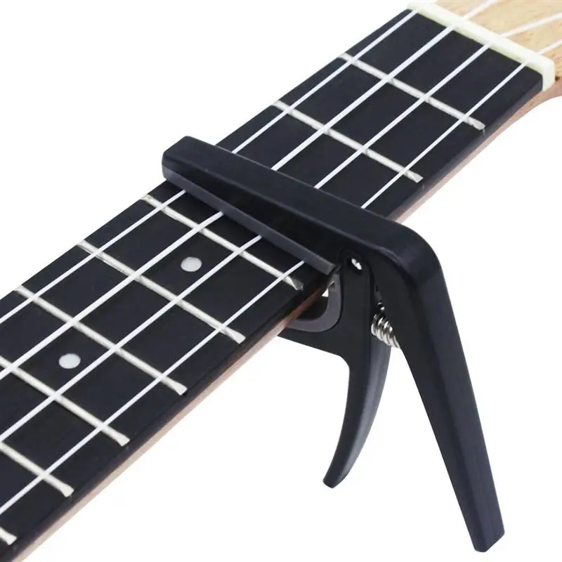 Ukulele Capo ABS Material Capo Trigger Style Lightweight Good Hand Feeling Musical Instruments for Ukulele
Ukulele Capo ABS Material Capo Trigger Style Lightweight Good Hand Feeling Musical Instruments for Ukulele