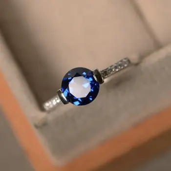 European and American Zircon London Blue Topaz Ring Exquisite Small Round S925 Sterling Silver Ladies Temperament Ring
European and American Zircon London Blue Topaz Ring Exquisite Small Round S925 Sterling Silver Ladies Temperament Ring