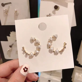 Korean Sweet Heart Shape Simulated Pearl Earrings for Women Girls Gold Color White Pearl Hoop Earrings Statement Jewelry Gift
Korean Sweet Heart Shape Simulated Pearl Earrings for Women Girls Gold Color White Pearl Hoop Earrings Statement Jewelry Gift