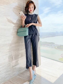 Contrast Lace Collar of the Waistband Sleeveless Shirt + Irregular Straight-Leg Pants Suit, Female 2020 Early Autumn New
Contrast Lace Collar of the Waistband Sleeveless Shirt + Irregular Straight-Leg Pants Suit, Female 2020 Early Autumn New