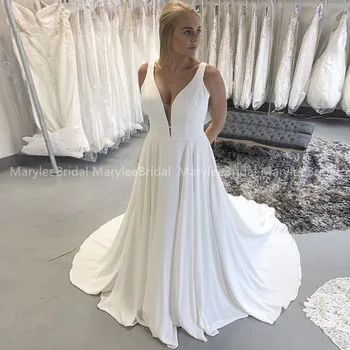 Simple V-neck Wedding Dress Sleeveless A-line White Ivory Bridal Gowns Backless Vestidos De Novia Custom Made Robe Mariage
Simple V-neck Wedding Dress Sleeveless A-line White Ivory Bridal Gowns Backless Vestidos De Novia Custom Made Robe Mariage