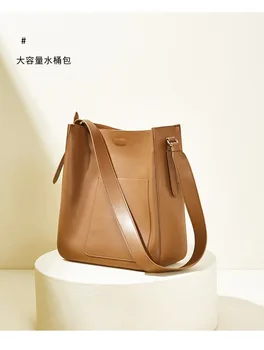 2020 new cowhide handbags Korean version of one-shoulder diagonal retro bag niche design large capacity bucket bag
2020 new cowhide handbags Korean version of one-shoulder diagonal retro bag niche design large capacity bucket bag