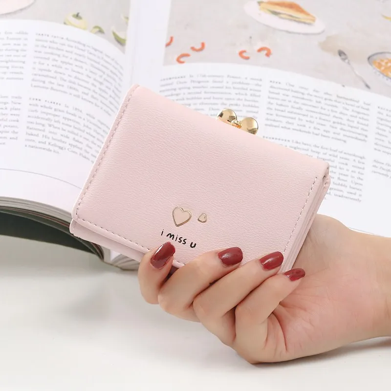 2020 new wallet women short peach heart small wallet Korean student small fresh three-folding coin holder
2020 new wallet women short peach heart small wallet Korean student small fresh three-folding coin holder