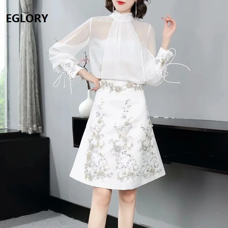 High Quality New Runway Skirt Suits 2021 Spring Summer 2 pc Set Women Silk Chiffon Tops Blouse+Vintage Embroidery Mini Skirt Set
High Quality New Runway Skirt Suits 2021 Spring Summer 2 pc Set Women Silk Chiffon Tops Blouse+Vintage Embroidery Mini Skirt Set