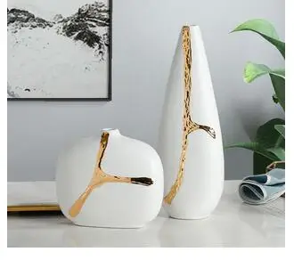 CREATIVE GOLD CERAMICS VASE SMALL MOUTH EXPENSIVE MODERN HOME DECORATIONS OUTLINE IN GOLD FLOWER ARRANGEMENT ACCESSORIES
CREATIVE GOLD CERAMICS VASE SMALL MOUTH EXPENSIVE MODERN HOME DECORATIONS OUTLINE IN GOLD FLOWER ARRANGEMENT ACCESSORIES