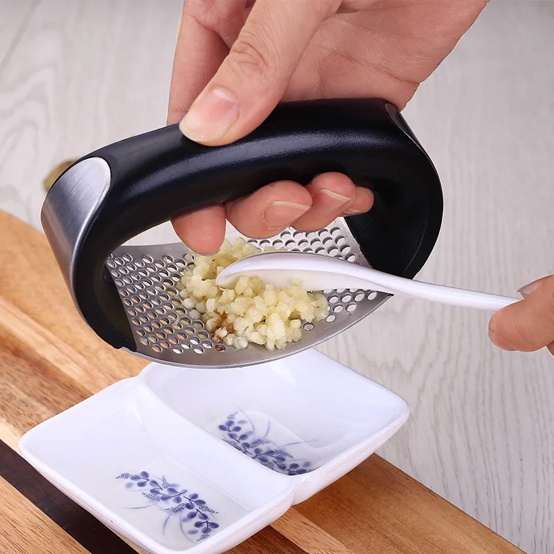 Stainless Steel Garlic Press Manual Ring Pound Garlic Home Kitchen Garlic Tool Household Garlic Puree Artifact
Stainless Steel Garlic Press Manual Ring Pound Garlic Home Kitchen Garlic Tool Household Garlic Puree Artifact