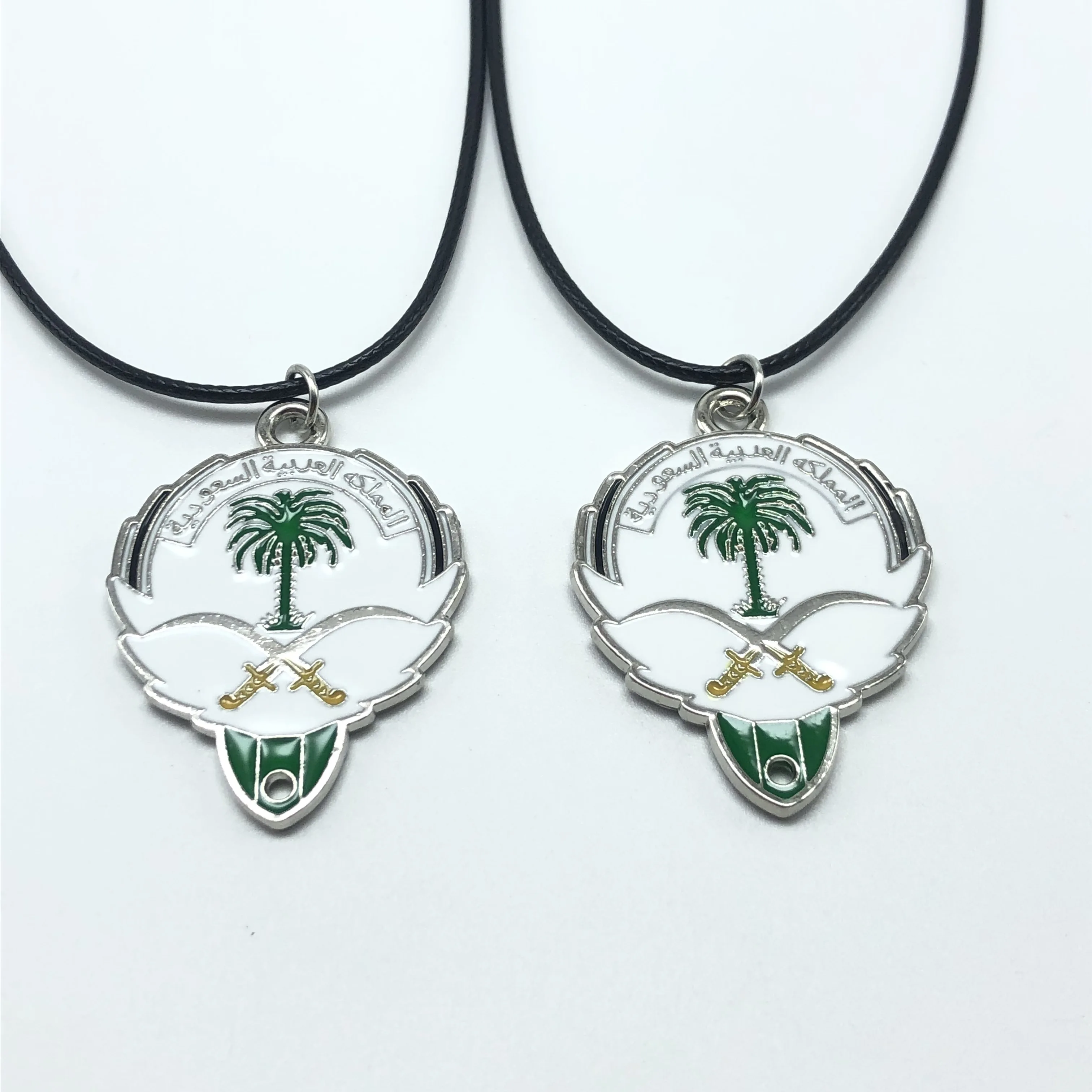 31*41mm silver/gold charm Saudi Arabia national emblem necklace DIY handmade boutique necklace black leather rope length of 45cm
31*41mm silver/gold charm Saudi Arabia national emblem necklace DIY handmade boutique necklace black leather rope length of 45cm