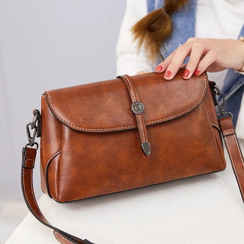 Oil wax leather women's bag 2019 spring and summer new women's bag vintage postman bag one shoulder oblique cross hand-held 
Oil wax leather women's bag 2019 spring and summer new women's bag vintage postman bag one shoulder oblique cross hand-held