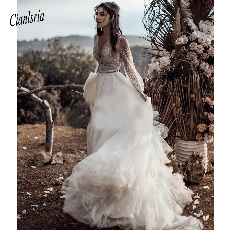 Vintage 2020 Beach A Line Wedding Dresses Deep V Neck Long Sleeves Boho Bridal Dress Plus Size Formal Party Wear Two Pieces
Vintage 2020 Beach A Line Wedding Dresses Deep V Neck Long Sleeves Boho Bridal Dress Plus Size Formal Party Wear Two Pieces