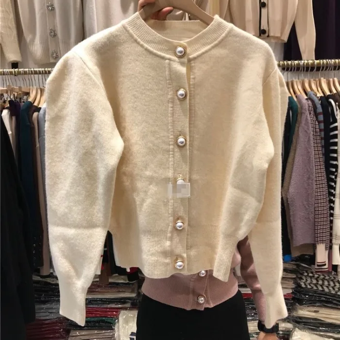 2019 Early New Sweater Round Collar Pearl Buckle Sweater Open Bubble Sleeve Woman V-Neck Cardigans Women Sweater
2019 Early New Sweater Round Collar Pearl Buckle Sweater Open Bubble Sleeve Woman V-Neck Cardigans Women Sweater