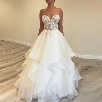 2020 New Sweetheart Sleeveless Beaded Lace Cascading Ruffles A Line White Свадебн плат Bridal Dresses
2020 New Sweetheart Sleeveless Beaded Lace Cascading Ruffles A Line White Свадебн плат Bridal Dresses