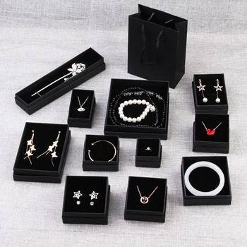24Pcs/lot Kraft Box Black Present Packaging Box Ring Earring Pendant Protection Christmas Gift Box 5x5cm Can Custom Your Logo
24Pcs/lot Kraft Box Black Present Packaging Box Ring Earring Pendant Protection Christmas Gift Box 5x5cm Can Custom Your Logo