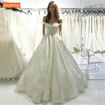 Elegant Ivory Ball Gown Wedding Dress Long Sweetheart Satin Pleat Off Shoulder Wedding Gowns Zipper Pockets Simple Bride Dresses 
Elegant Ivory Ball Gown Wedding Dress Long Sweetheart Satin Pleat Off Shoulder Wedding Gowns Zipper Pockets Simple Bride Dresses