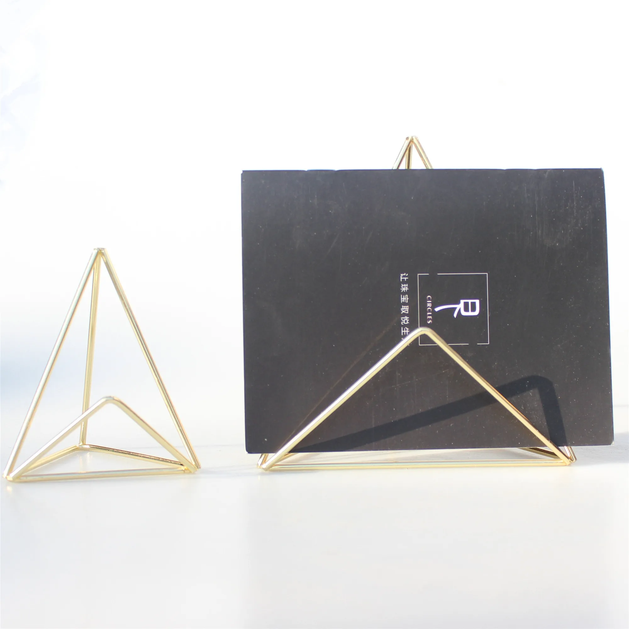 Metal Gold Geometric Triangle Shape Card Holder Display Jewelry Ring Earring Business Card Wedding Card
Metal Gold Geometric Triangle Shape Card Holder Display Jewelry Ring Earring Business Card Wedding Card