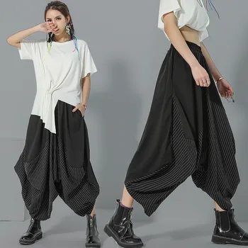 WOMENGAGA 2020 Summer New Patchwork Twill Irregular Personality Pants Large Size Casual Elastic Waist Loose Streetwear A038
WOMENGAGA 2020 Summer New Patchwork Twill Irregular Personality Pants Large Size Casual Elastic Waist Loose Streetwear A038