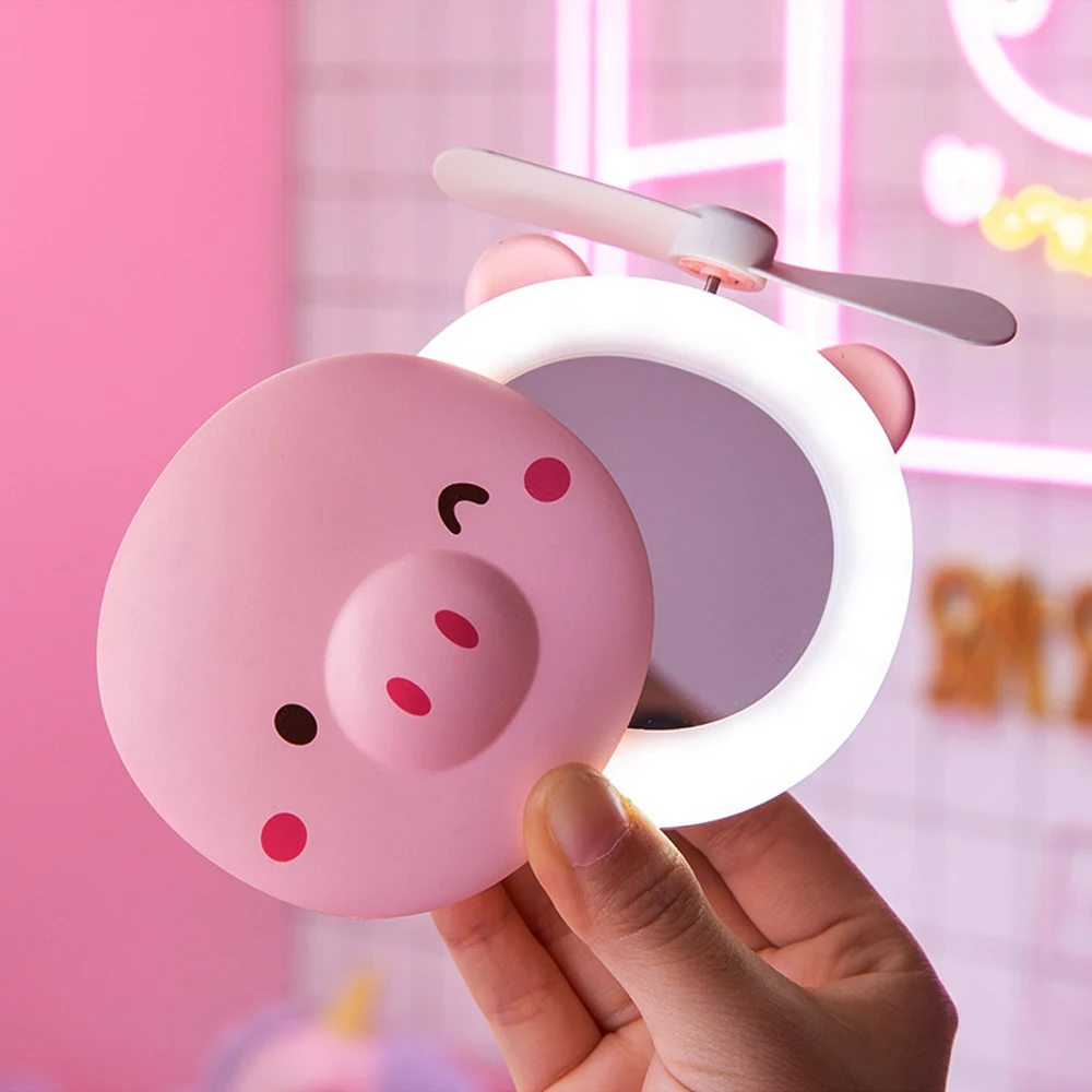 2 in 1 Mini Handheld Fan Makeup Mirror Portable Pig Cartoon LED Light Cosmetic Beauty Mirror USB Rechargeable Small Cooling Fan
2 in 1 Mini Handheld Fan Makeup Mirror Portable Pig Cartoon LED Light Cosmetic Beauty Mirror USB Rechargeable Small Cooling Fan