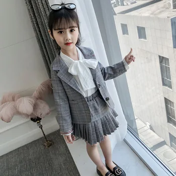 New 5-10-year-old children's version of the spring baby girl's fashion personality plaid suit + plaid skirt two-piece suit 
New 5-10-year-old children's version of the spring baby girl's fashion personality plaid suit + plaid skirt two-piece suit