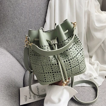 High Quality Tote PU Leather Bucke Crossbody Bags For Women 2019 Hollow Out Designer Female Shoulder Messenger Bag Lady Handbags 
High Quality Tote PU Leather Bucke Crossbody Bags For Women 2019 Hollow Out Designer Female Shoulder Messenger Bag Lady Handbags