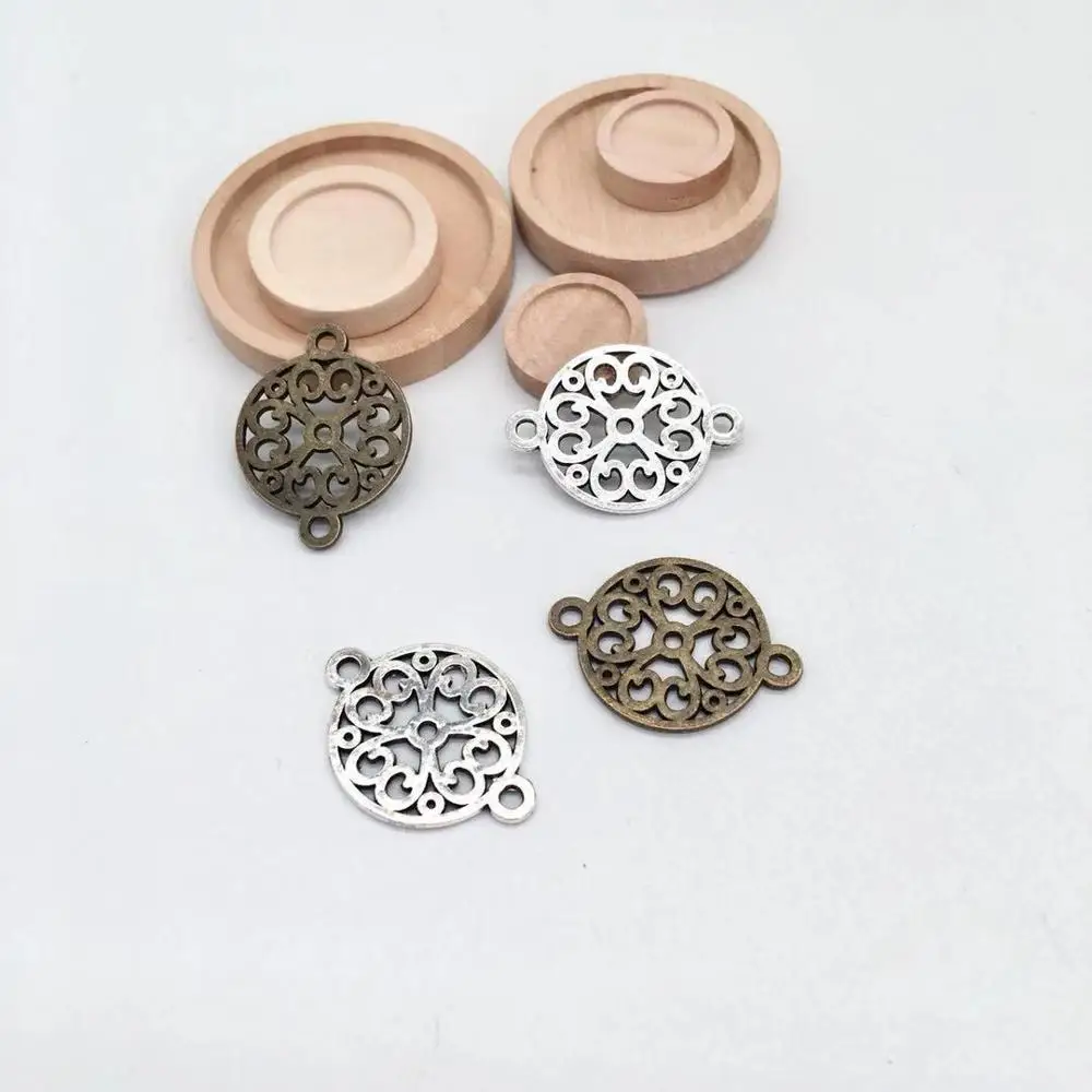 Vintage 27 PCS 24*18mm Metal Zinc Alloy Double lifting hole connector Charms Fit Jewelry Round Pendant Charms Makings
Vintage 27 PCS 24*18mm Metal Zinc Alloy Double lifting hole connector Charms Fit Jewelry Round Pendant Charms Makings
