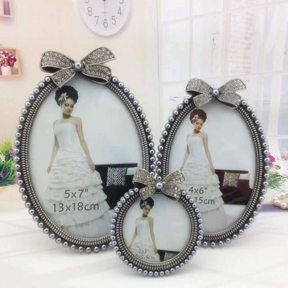 Promotional Factory Direct Retro Gray Alloy Bow 3 Inch Children Photo Frame Round 6 Inch 7 Inch Bow Swing Table Wholesale
Promotional Factory Direct Retro Gray Alloy Bow 3 Inch Children Photo Frame Round 6 Inch 7 Inch Bow Swing Table Wholesale